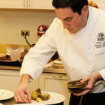 Chef Dominic Orsini at Silver Oak prepping Frisee Salad of Black Truffles